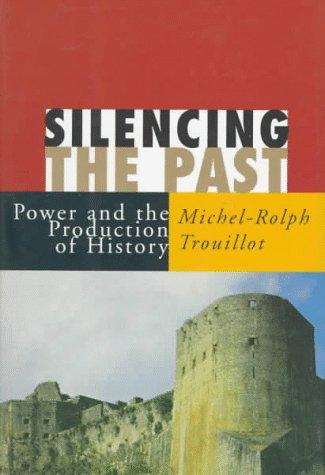 A book cover: 'Silencing the Past' in large capitals on red, the subtitle and author's name on a band below, over a photograph of a massive stone fortress on a hilltop