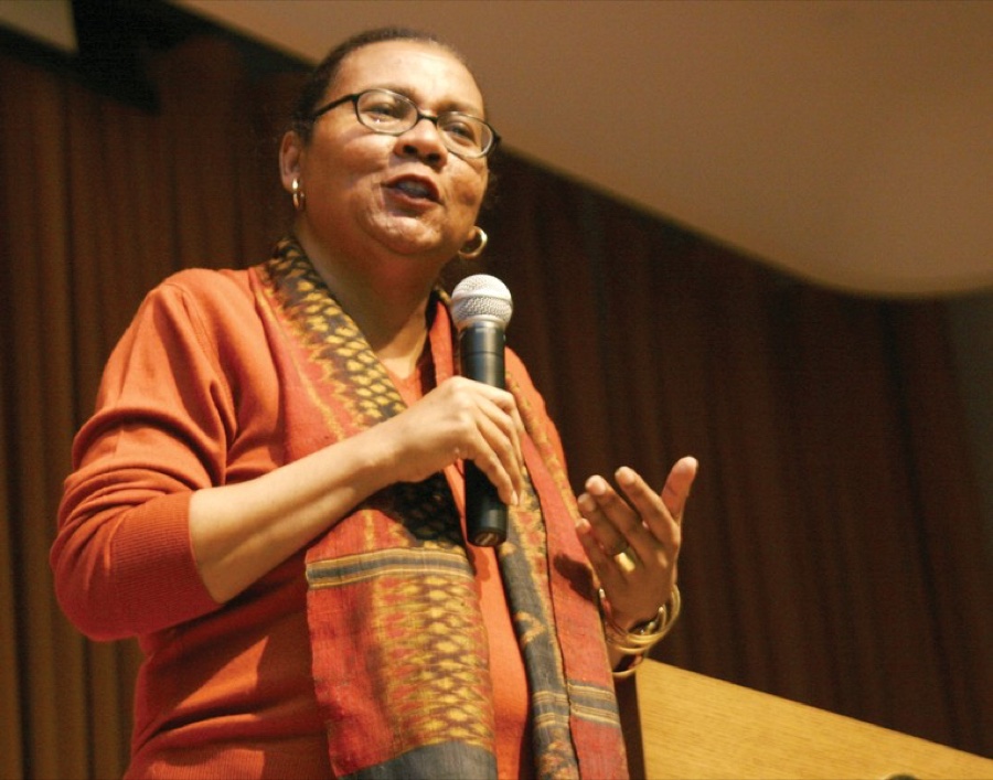 bell hooks speaking into a microphone