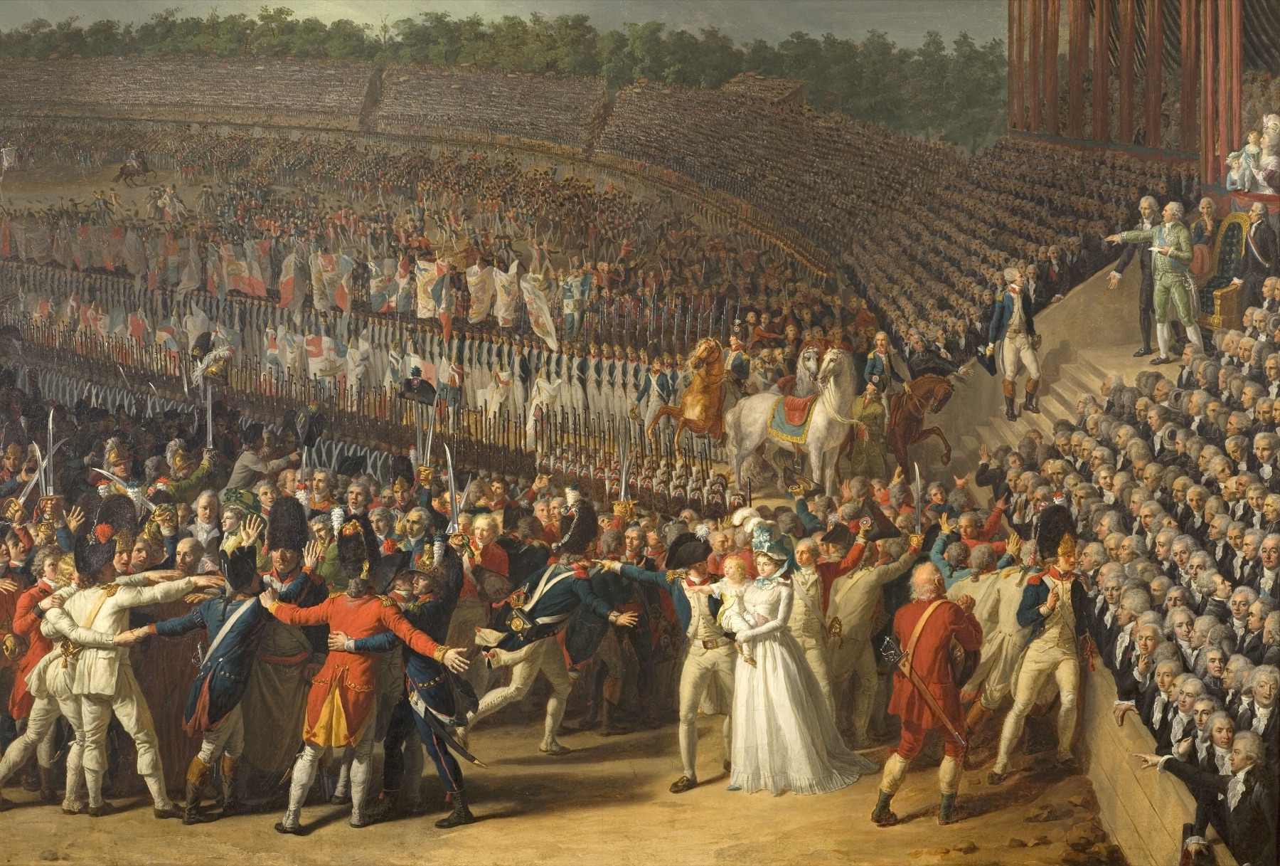 A crowded oil painting of a vast open-air amphitheater: tiers of spectators, rows of soldiers with tricolor banners, mounted officers, and in the foreground men in uniform embracing and swearing an oath beside a woman in white