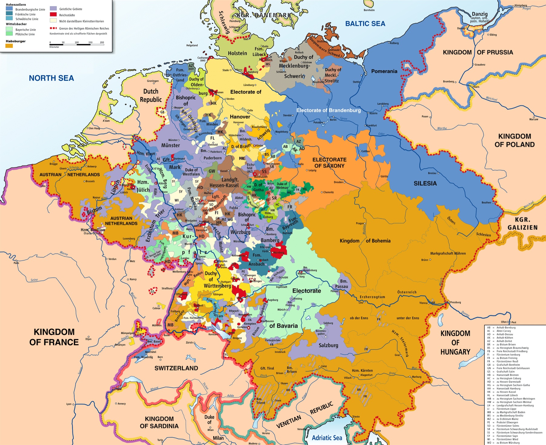 A color map of central Europe in 1789 cut into hundreds of patches: large orange Habsburg lands in the south-east, blue Prussian lands in the north-east, and a dense scatter of small purple church territories and red free cities in between, inside a dotted red border