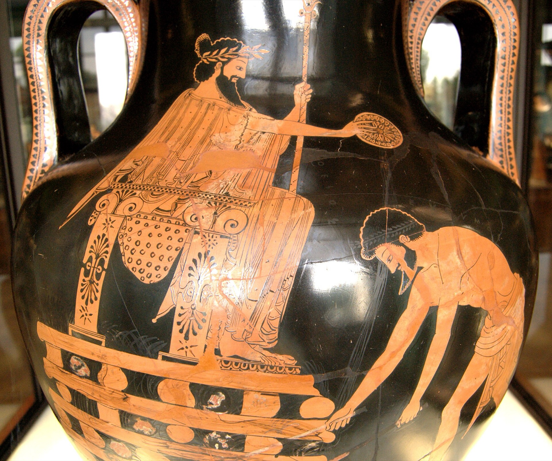 Attic red-figure amphora by Myson showing Croesus enthroned on the pyre, pouring a libation, while an attendant lights the wood below