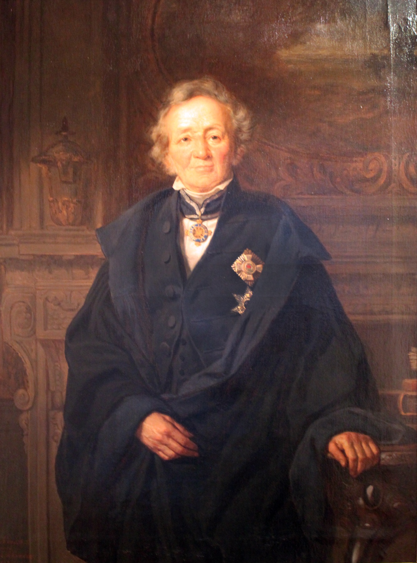 Painted portrait of a very old man with white hair, seated in a carved wooden chair, wrapped in a dark cloak over a buttoned coat, with two star-shaped decorations pinned to his chest