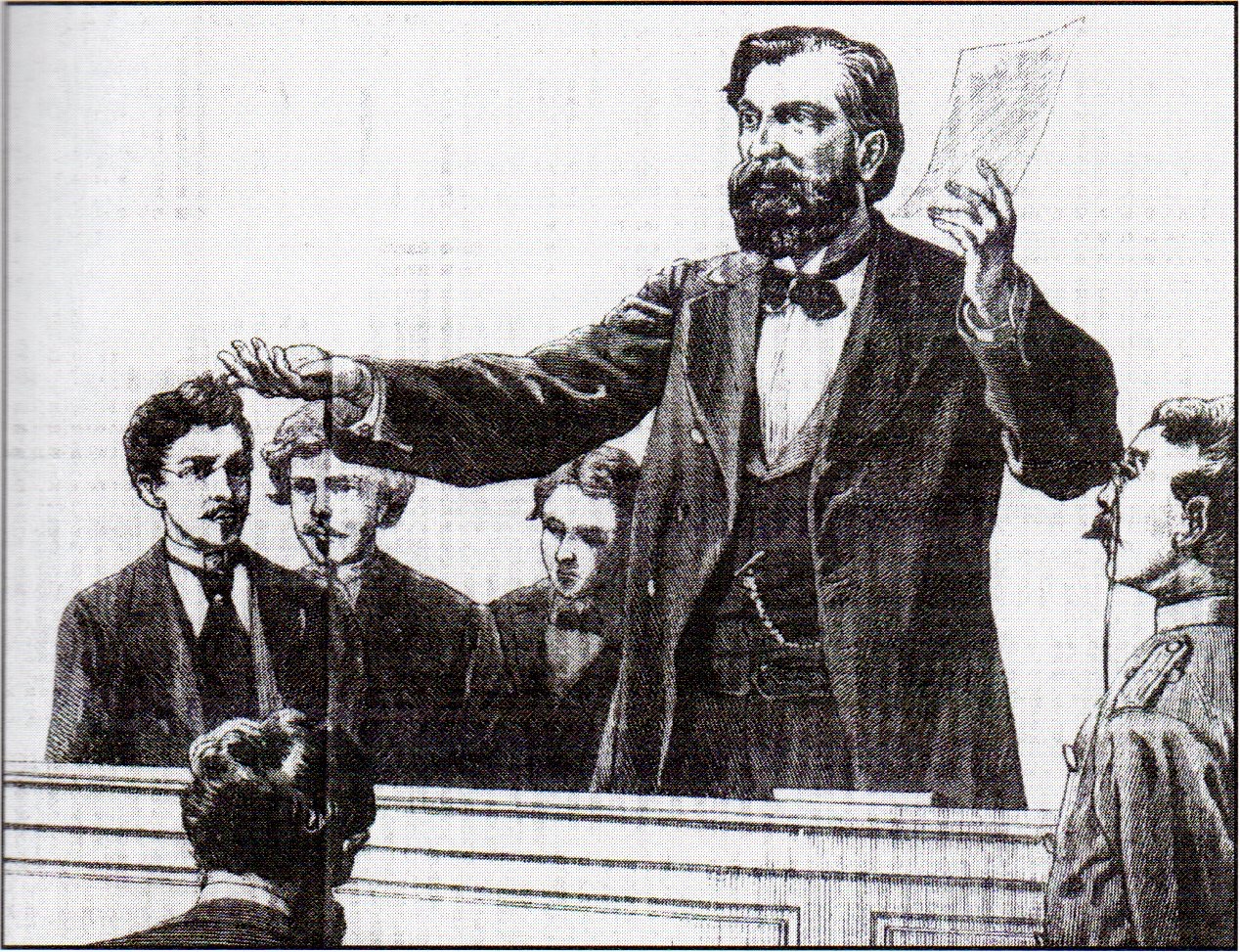 An engraving of a bearded man lecturing from a raised desk, one arm flung out over rows of young men who lean toward him, a sheet of paper raised in his other hand